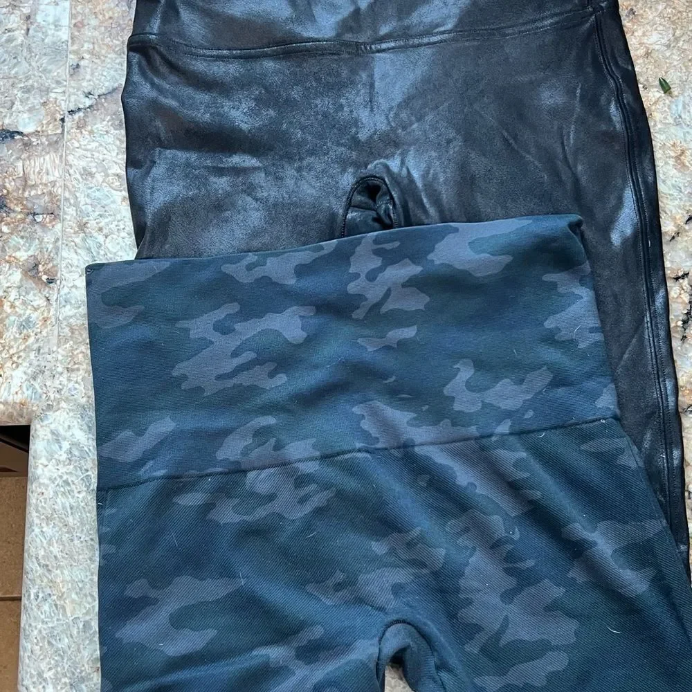 2 Spanx Black and Camouflage Leggings